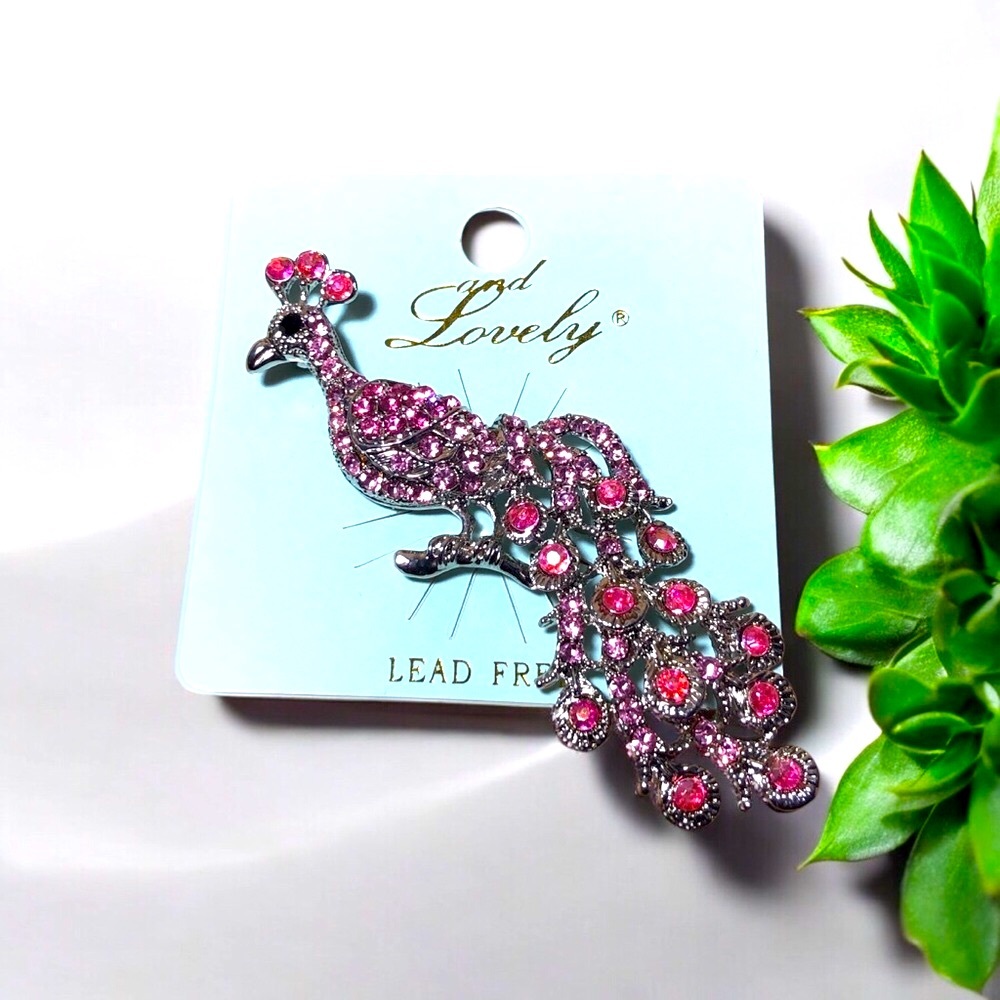 17. and Lovely Pink Peacock Brooch